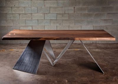 La Portée Black Walnut Dining Room Table with aluminum inserts